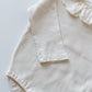 Nora ruffle romper creme